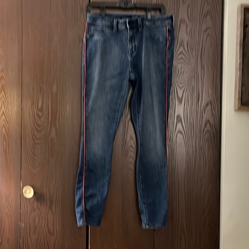 Universal Thread blue jeans with red cording down the sides. Size 12.